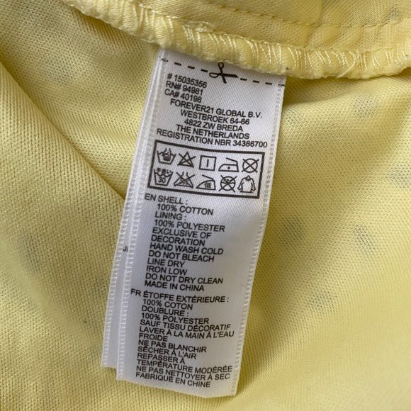 F21 Peplum eyelet dress in yellow, large - Picture 3 of 4